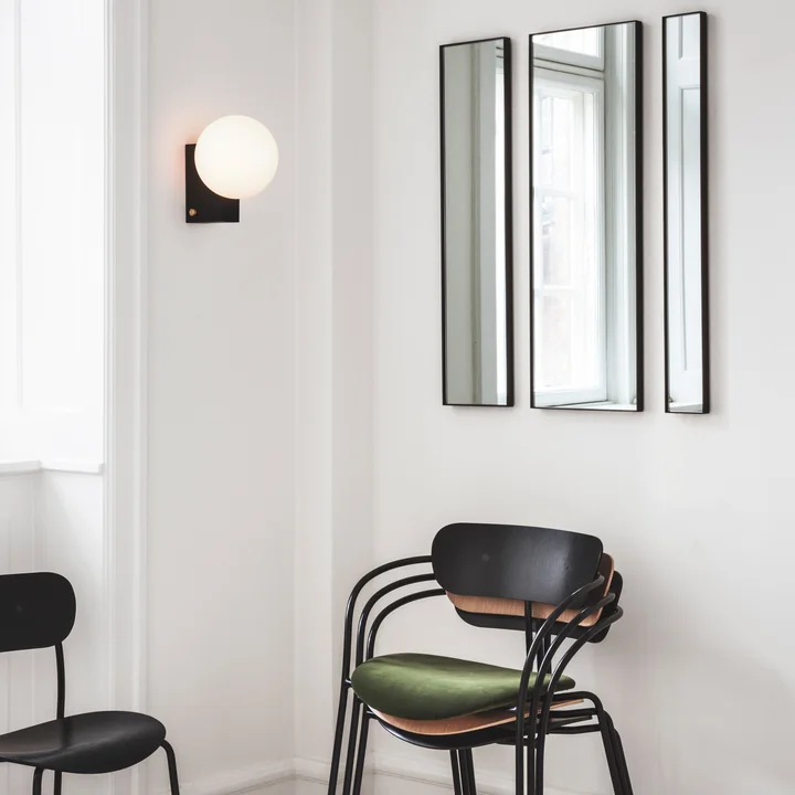 Amore wall mirror, Journey table and wall lamp, Pavilion armchair and Pavilion chair from & Tradition