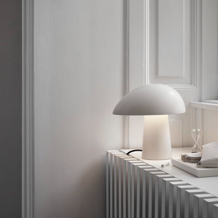 The Fritz Hansen - Night Owl Table lamp on the window sill