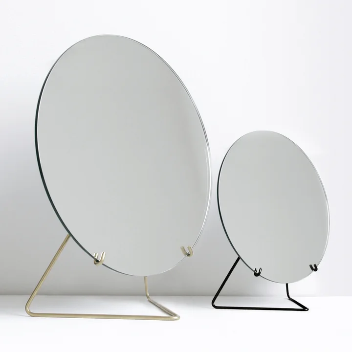 Table mirror from Moebe in brass and black