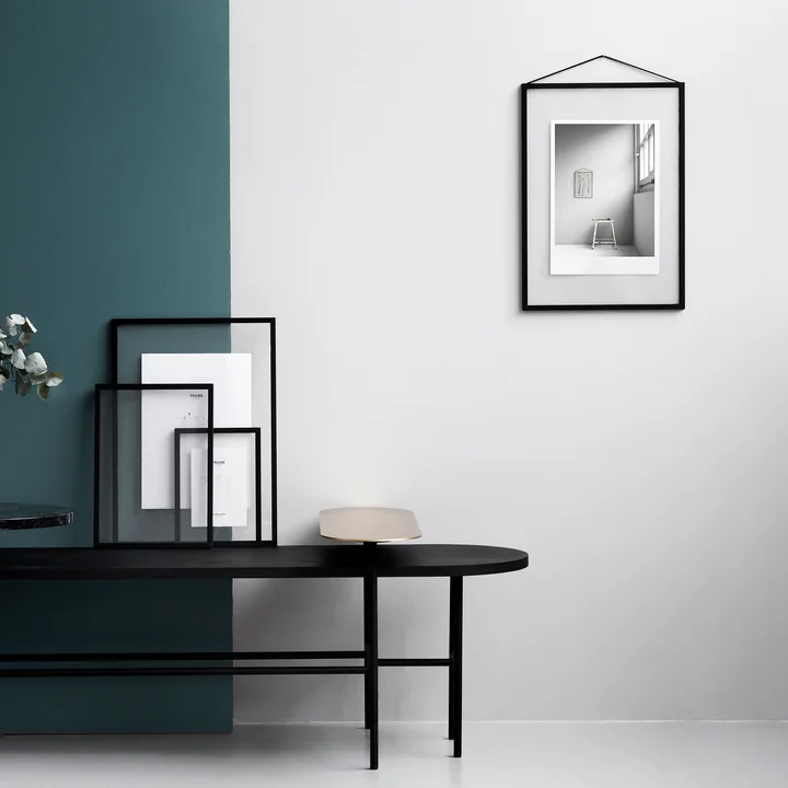 Frame Picture frame from Moebe in black on the wall and on the table