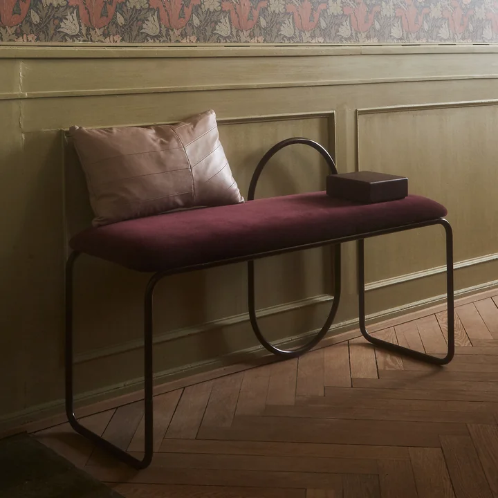 Angui bench from AYTM in bordeaux on the wall