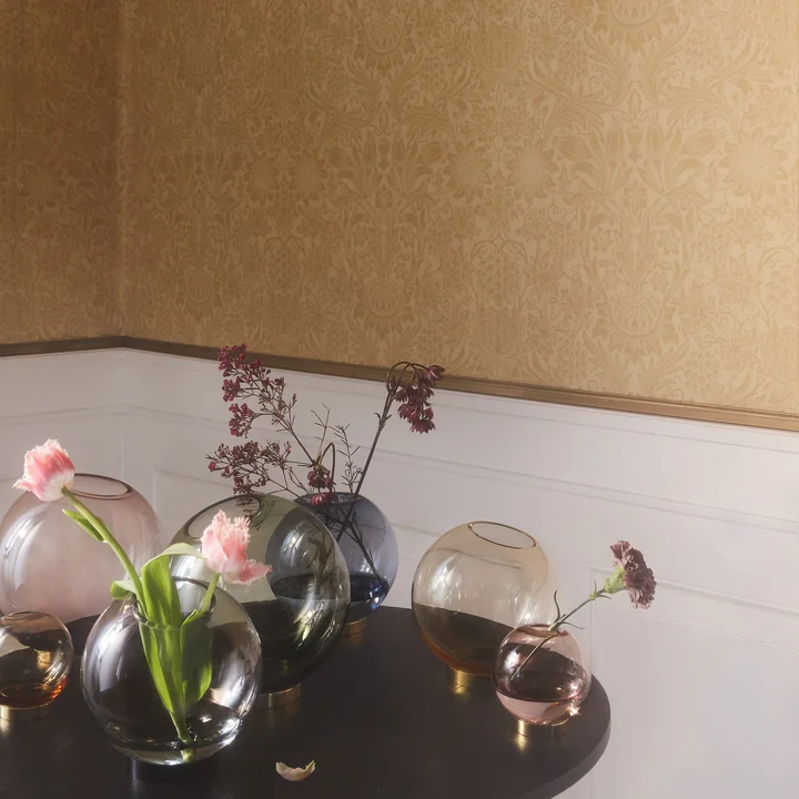 Globe Vase of AYTM in different sizes and colors on the table