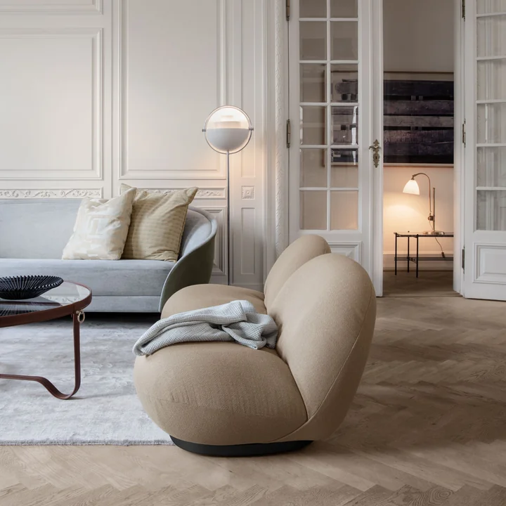 Pacha Lounge Chair and the Adnet Coffee Table Circular Multi Lite Lamp from Gubi in the living room
