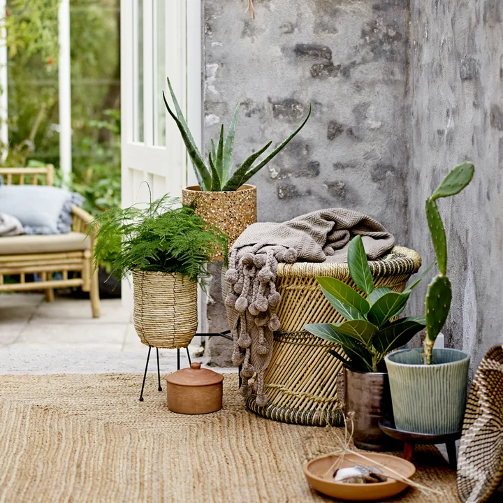 Plant pot with frame from Bloomingville on the terrace