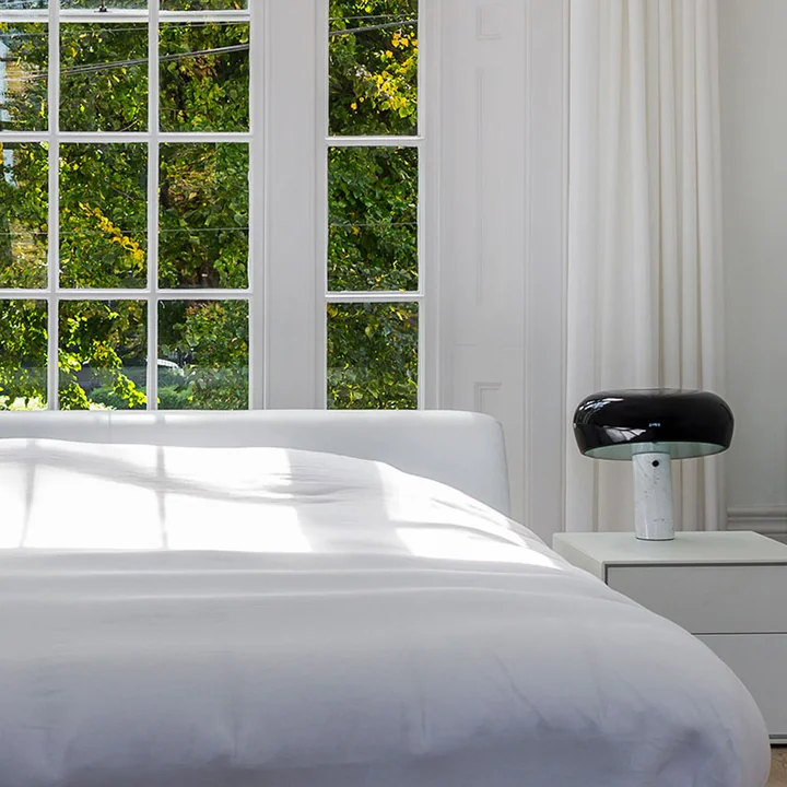 Snoopy Table lamp from Flos on the bedside table