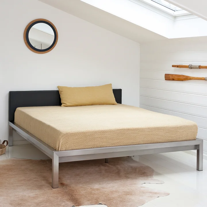 Pure bed by Hans Hansen in a bedroom ambience