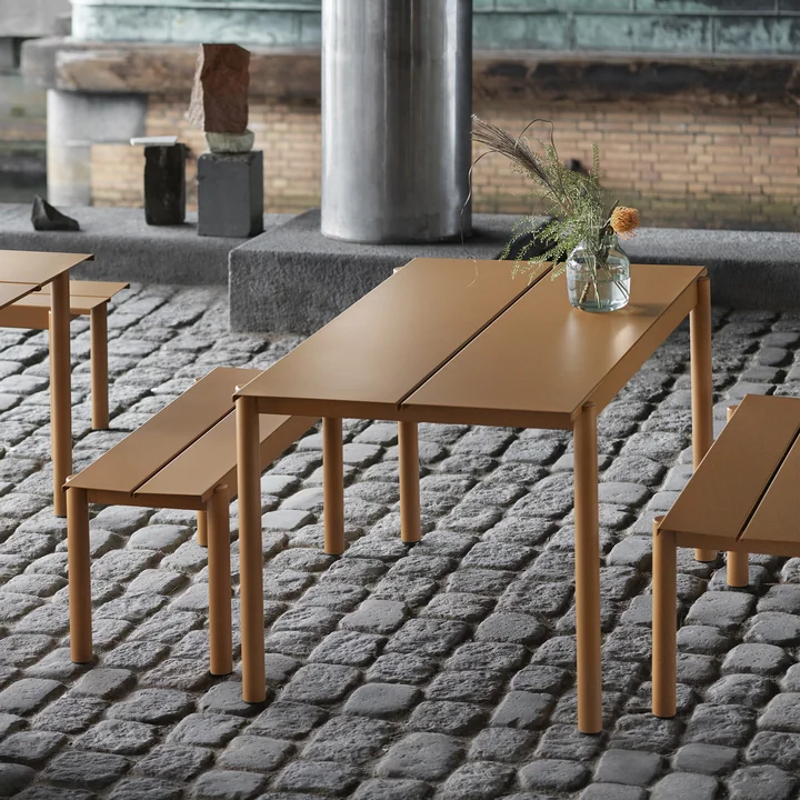 Linear Steel Outdoor bench and table in burnt orange from Muuto