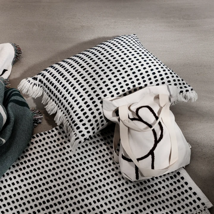 Way outdoor cushion and carpet in off-white / blue by Ferm Living in combination