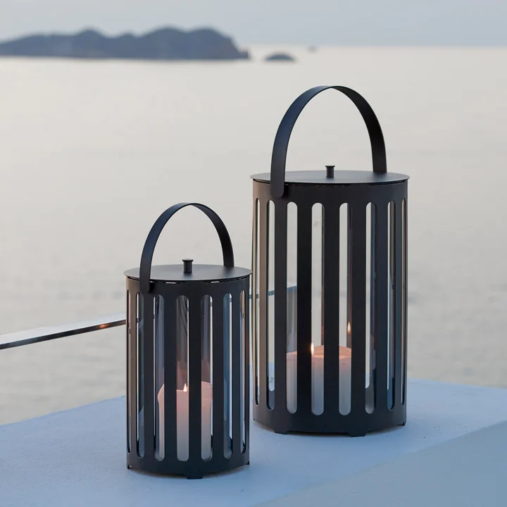 Light tube lanterns by Cane-line in lava gray