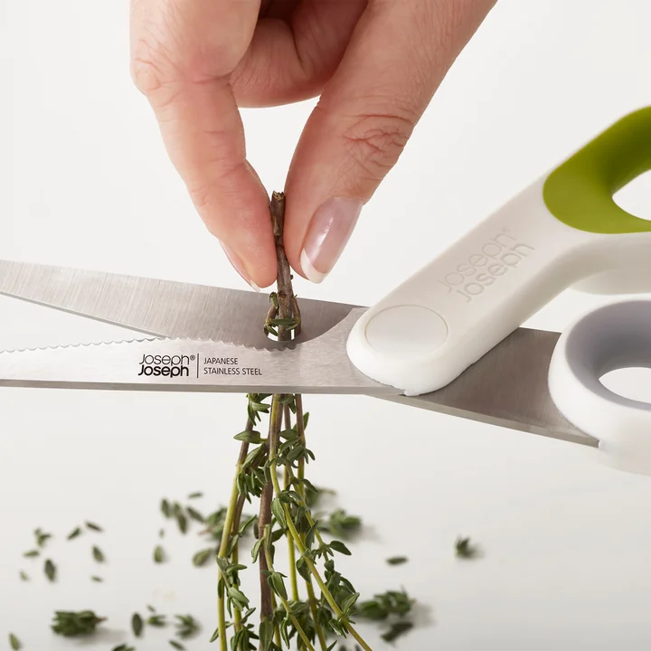Powergrip kitchen scissors by Joseph Joseph in white / green
