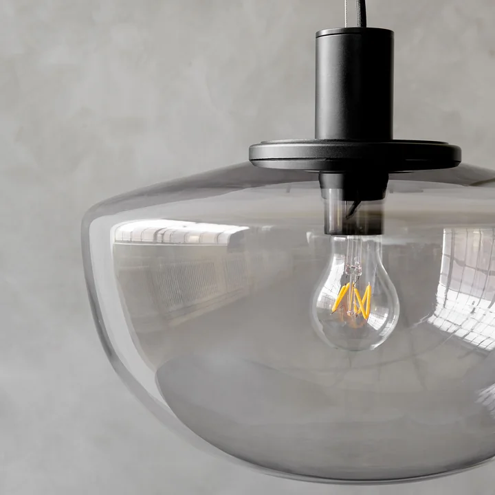 Bench pendant lamp from Audo with smoke gray glass