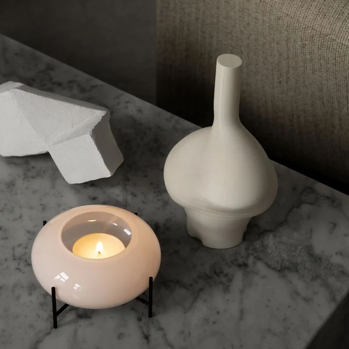Échasse Hurricane tea light holder from Audo on the table