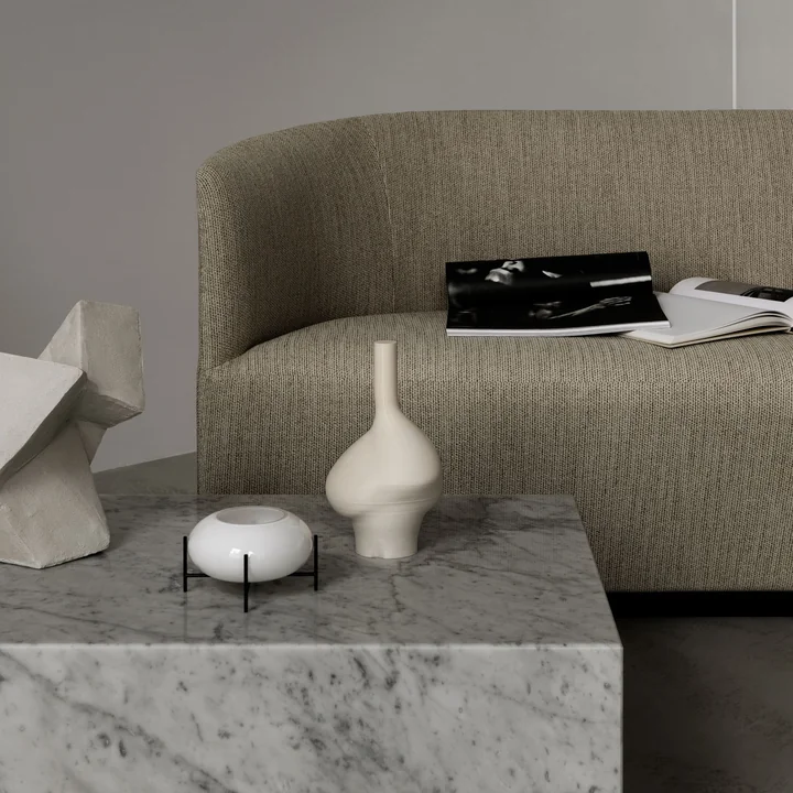 Échasse Hurricane tea light holder from Audo on the coffee table