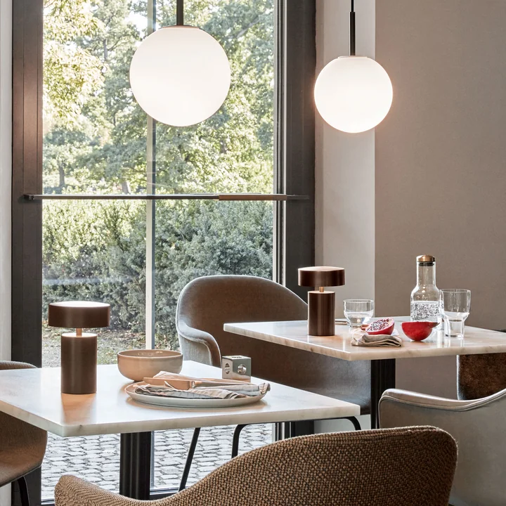 Column table lamp, TR pendant lamp, Plinth side table and New Norm water bottle by Audo