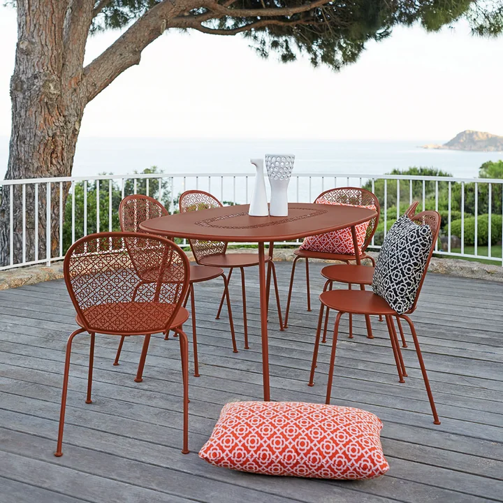 The Lorette chairs and table from Fermob on a roof terrace