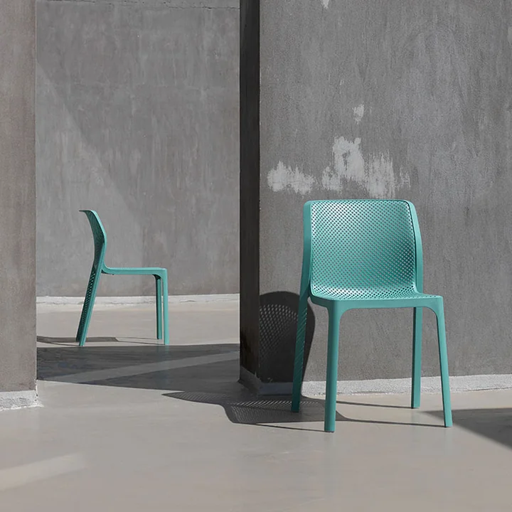 The Bit chair from in Nardi front of a concrete wall
