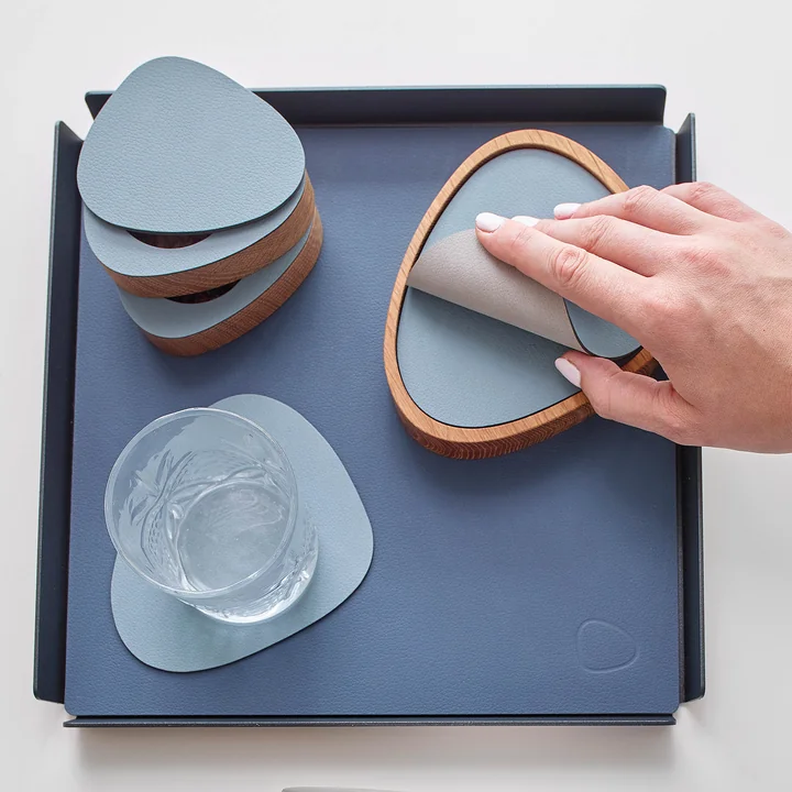 Glasuntersetzer Curve from Lind DNA in Nupo light blue