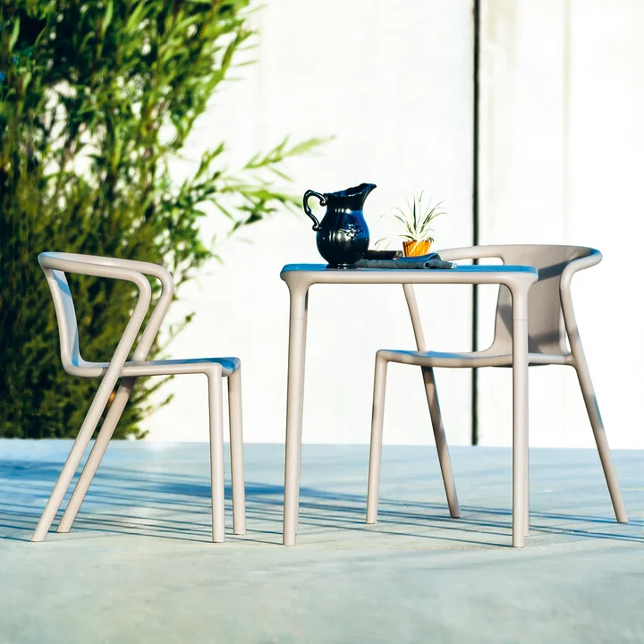 Air Table Outdoor, 65 x 65 cm in beige and Air Armchair by Magis on the terrace 