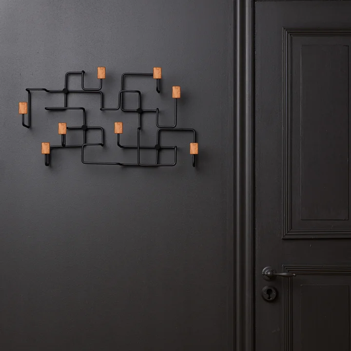 Underground wall wardrobe in oak / black by Gejst on the wall 