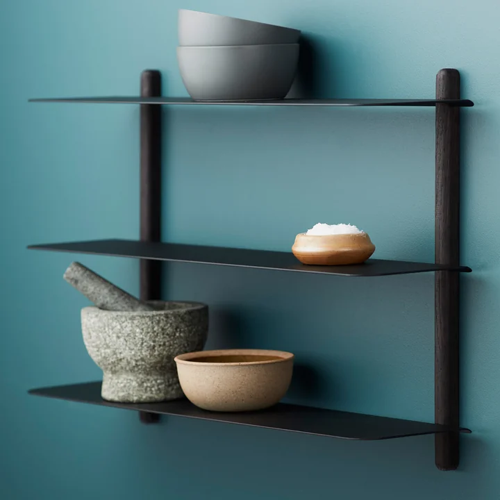Nivo Wall shelf A in black from Gejst in front of a colored wall