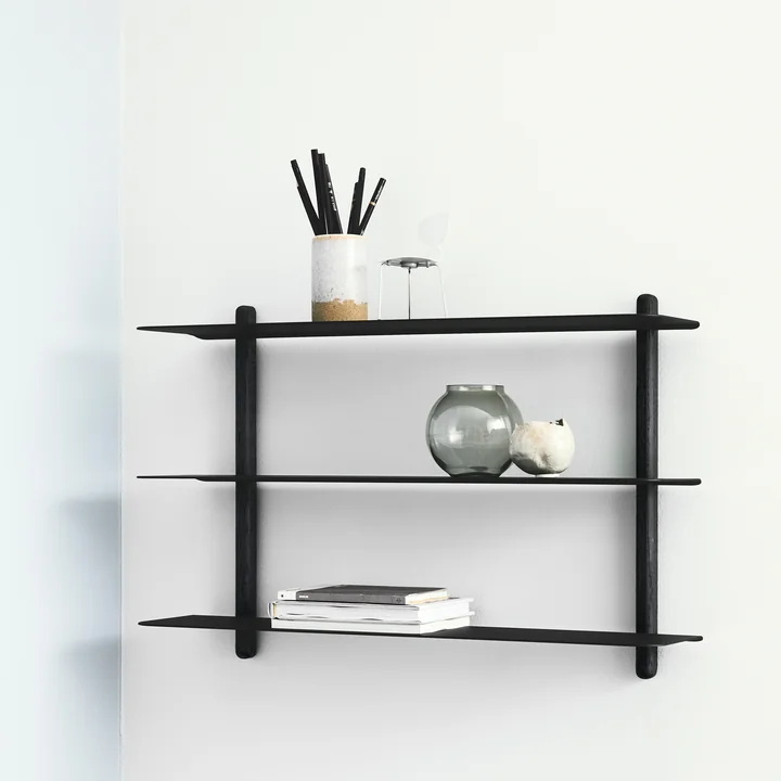 Nivo Wall shelf A in black from Gejst at the decorated with plants and vases