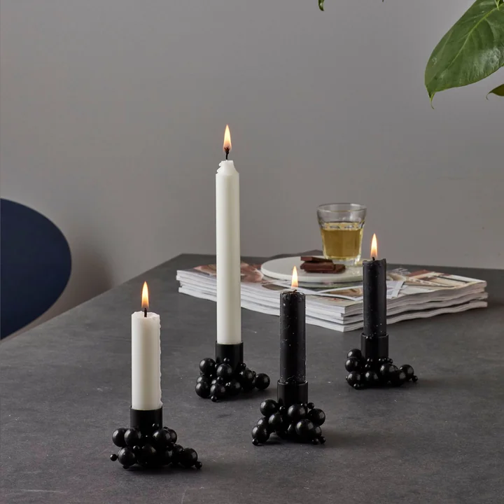 Molekyl candle holder 4, black from Gejst on the table 