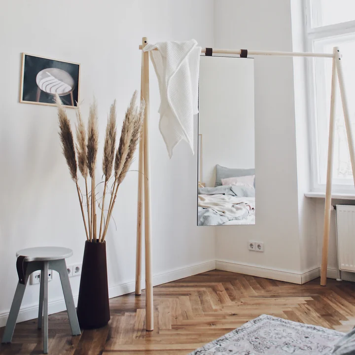 Hongi Coat rack with mirror in nature from Karup Design arranged in the room