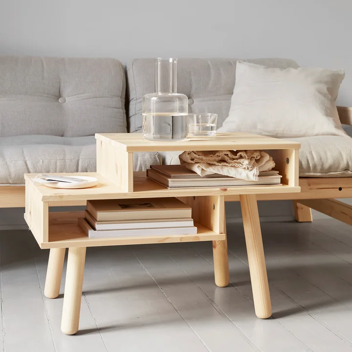 Hako coffee table in nature by Karup Design in front of the sofa