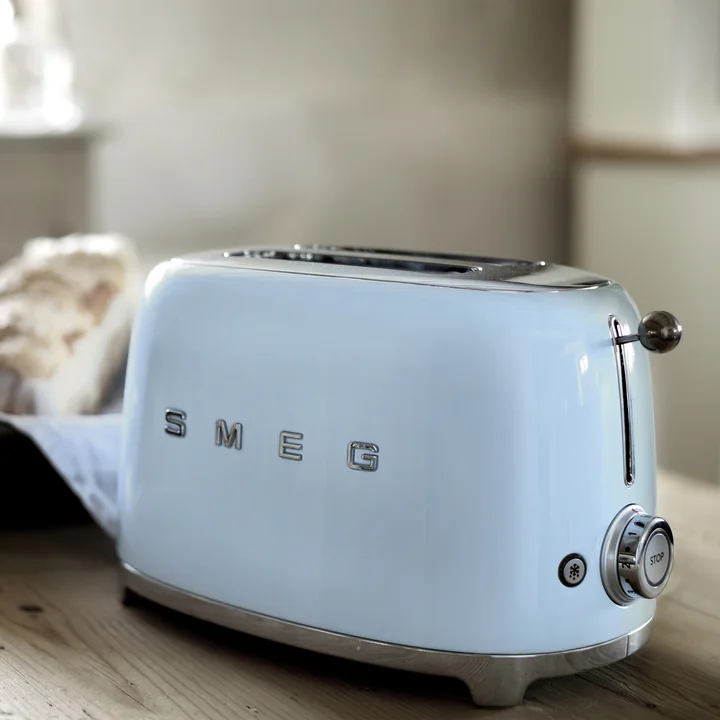 2-slice toaster TSF01 in pastel green from Smeg on the breakfast table