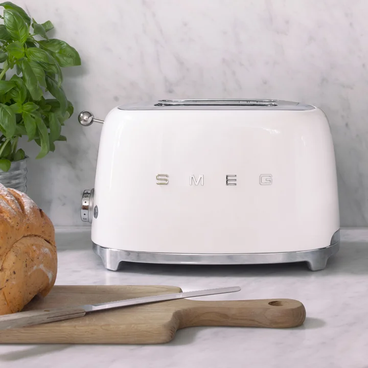 2-slice toaster TSF01 in white from Smeg on the kitchen counter