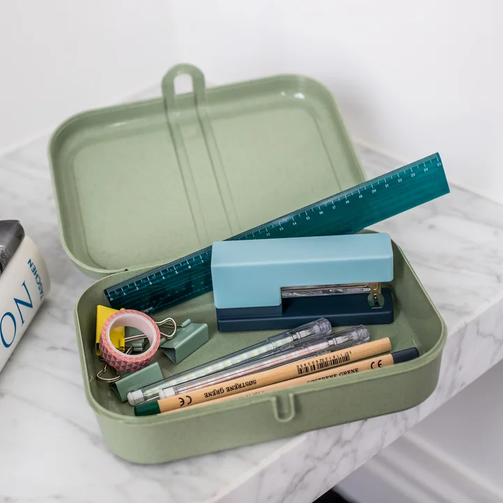 Pascal L lunch box with divider in organic green from Koziol with stationery