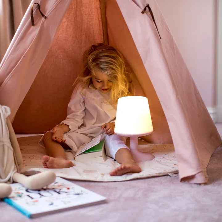 Light to go battery-powered table lamp in organic pink by Koziol in children's room 