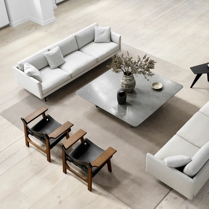 Spanish Chair in oak smoked and oiled / Leather black by Fredericia in a sitting corner