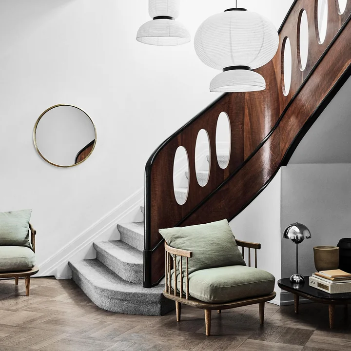Sillon wall mirror from & tradition on the stairs