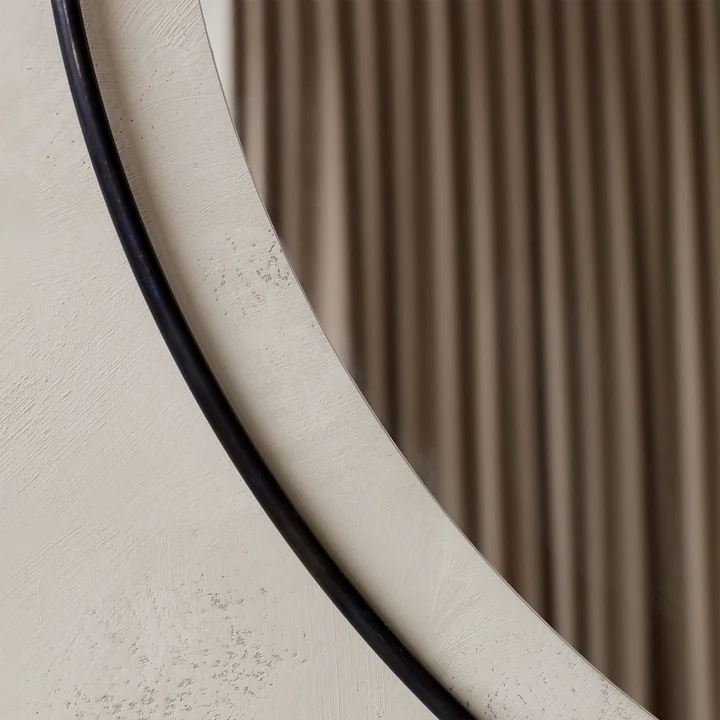 Nimbus mirror, burnished brass from Audo in detail