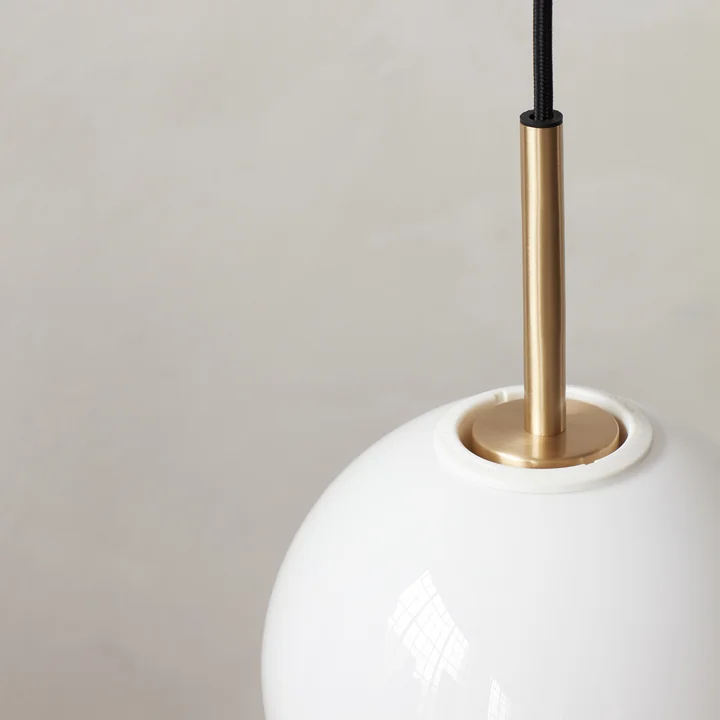 TR pendant light from Audo in brass / light source shiny opal