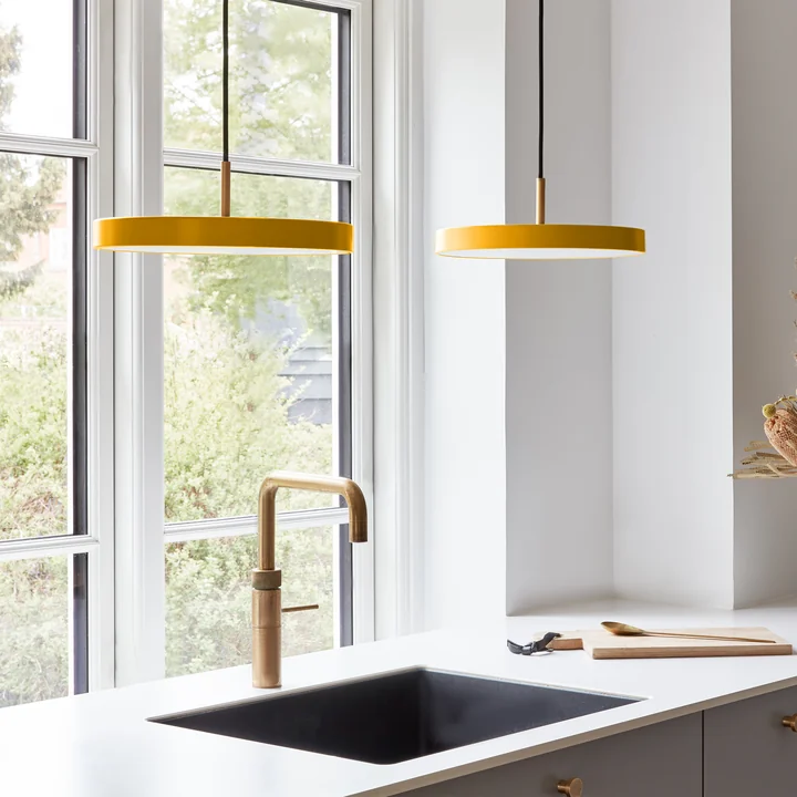 Asteria Mini LED pendant light from Umage in saffron yellow