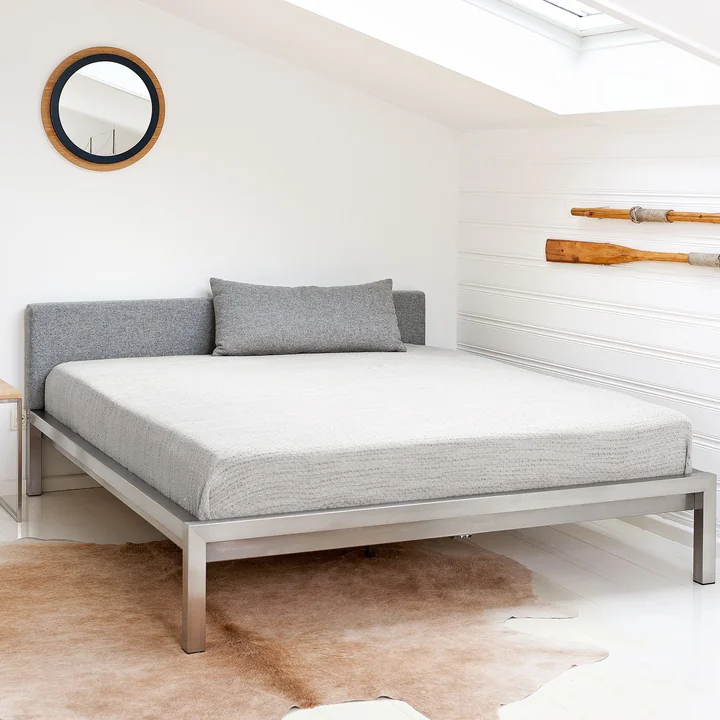 Pure bed (incl. upholstered headboard Velito grey) by Hans Hansen in stainless steel