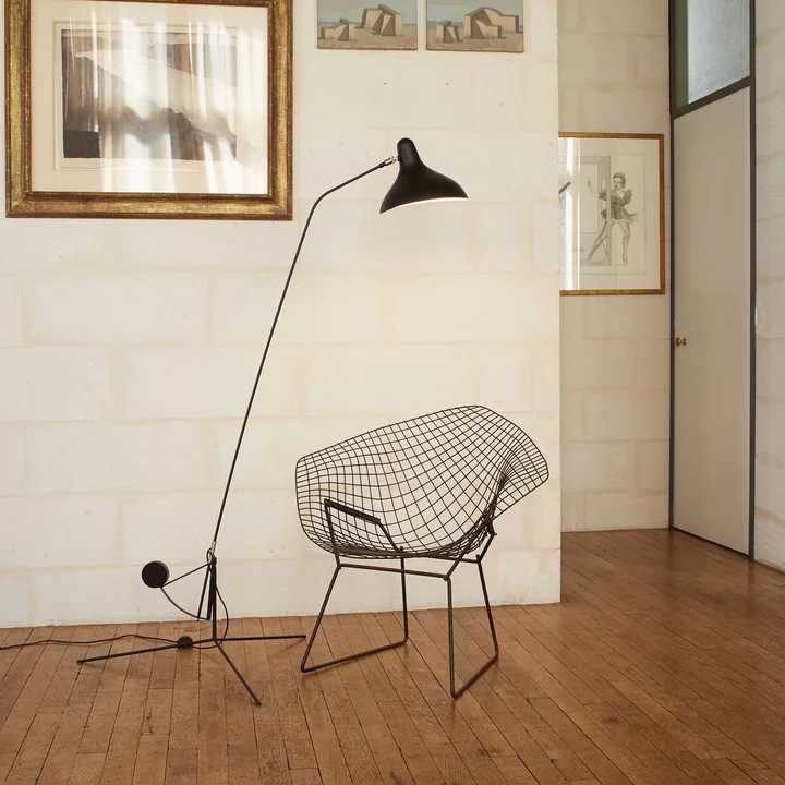 Mantis BS1 floor lamp, black from DCW next to the armchair