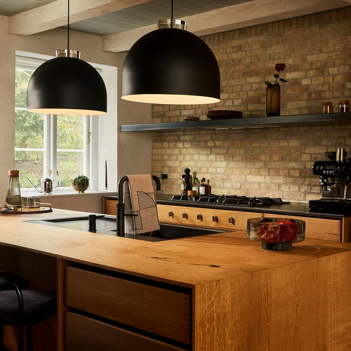 Luceo pendant luminaire from AYTM above the kitchen unit