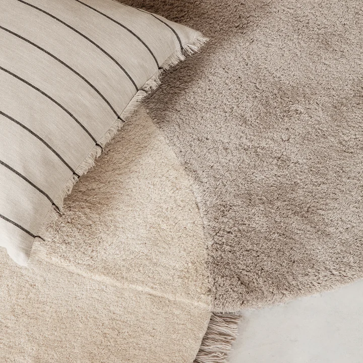 View Tufted rug and Calm cushion from Ferm Living