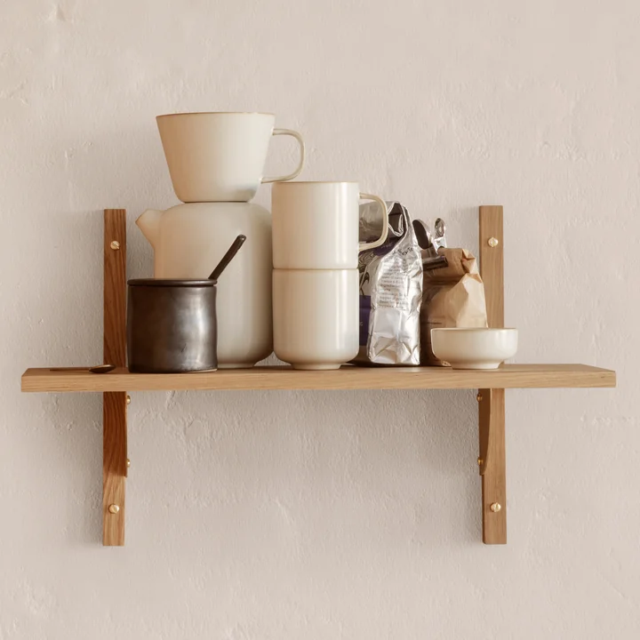 Various Ferm Living articles on the Sector wall shelf