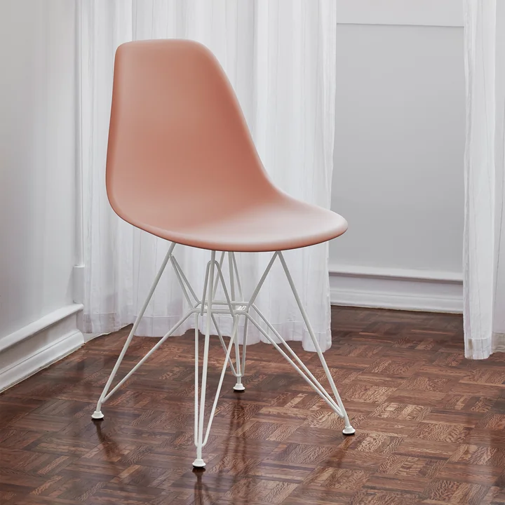 Eames Plastic Side Chair DSR from Vitra in white / soft pink (felt glides white)
