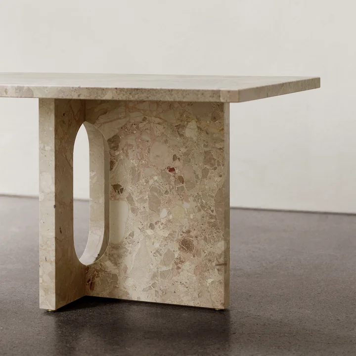 The Androgyne Lounge Table from Audo convinces with a striking stone grain