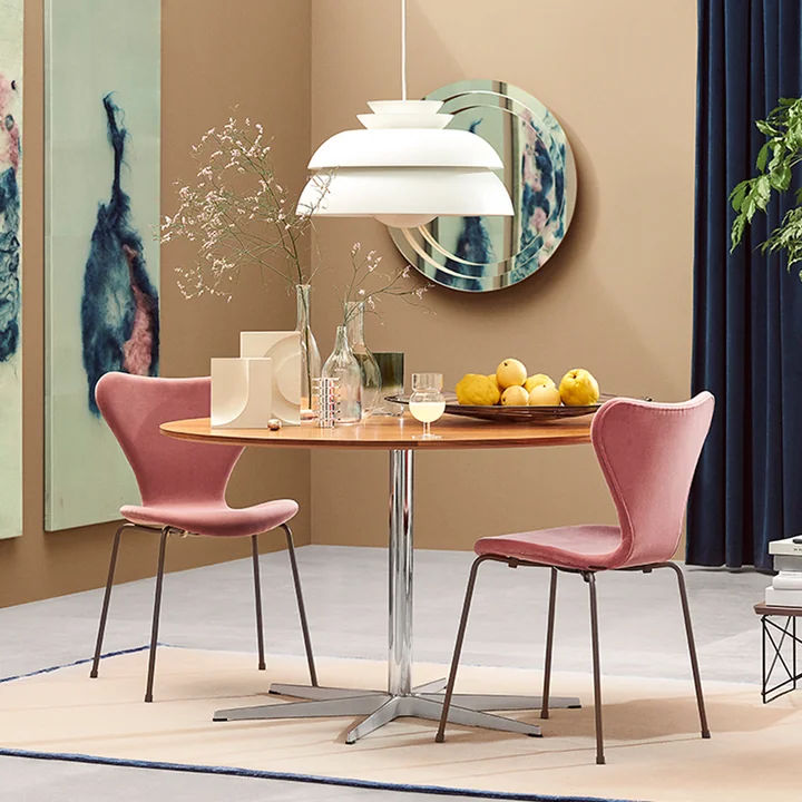 Series 7 upholstered chair and Concert pendant light by Fritz Hansen