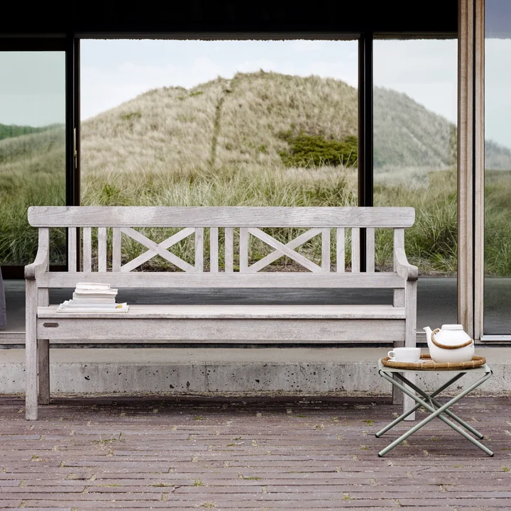 The Drachmann Bench from Skagerak with a small side table