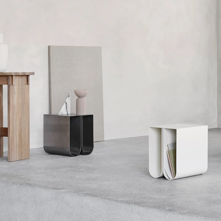 Curved side table by Kristina Dam Studio in beige and stainless steel
