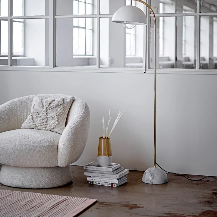 Gulzar 3D cushion on the Ted Lounge Chair by Bloomingville in the cream-colored living room ambience