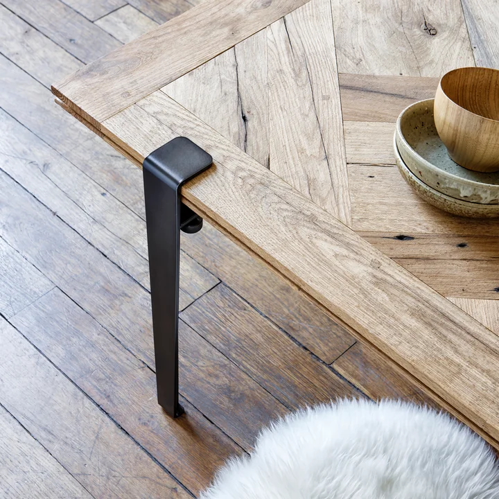 The coffee table and bench leg H 43 cm, graphite black from TipToe with a rustic black and wood contrast in the living room