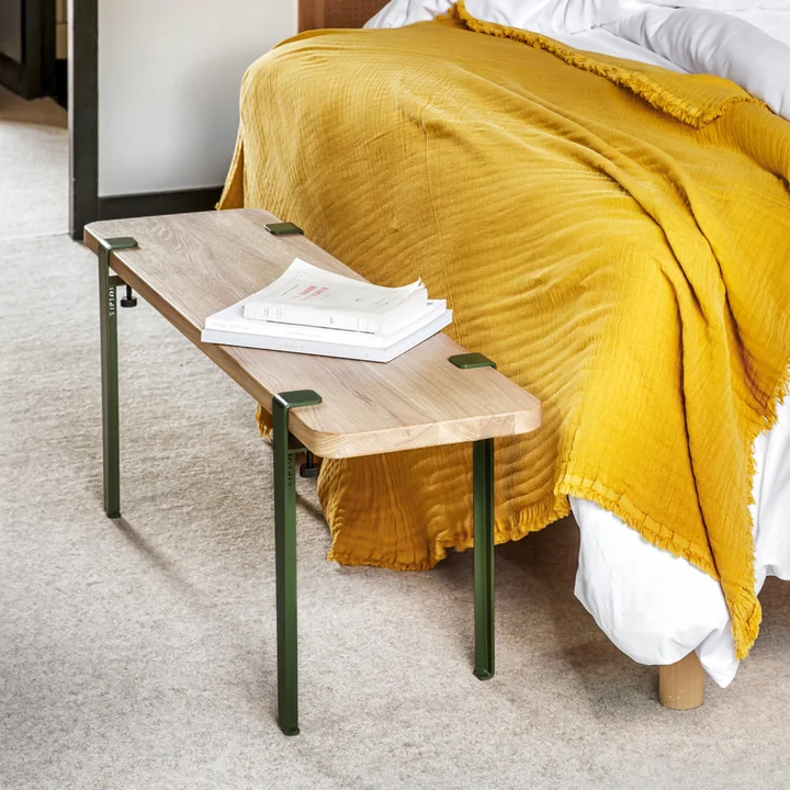 The DUKE bench, oak from TipToe as a storage place by the bed in the bedroom.